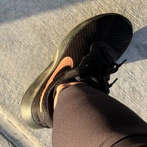 Nike Women's Black Running Sneakers with Copper Swoosh